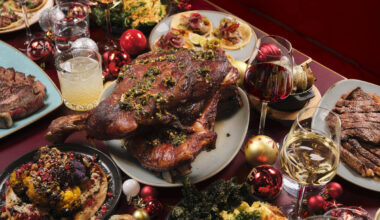 a pineapple hedgehog dish, with spears of pineapple poking out of a metal hedgehog ornament