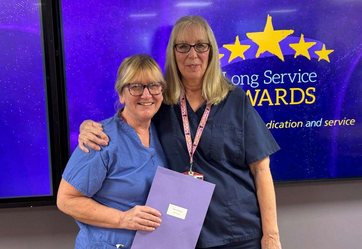 Two colleagues at Queen Elizabeth Hospital in King’s Lynn celebrate a combined 75 years in the NHS