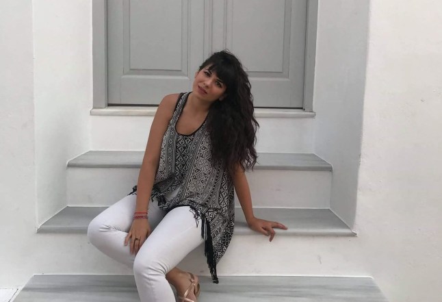 Dimitra Staikou poses on stairs