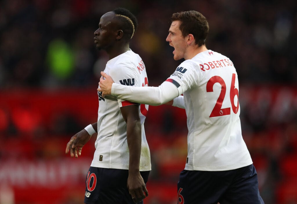 Sadio Mane and Andy Robertson pictured in conversation during Liverpool's Premier League match against Manchester United at Old Trafford.
