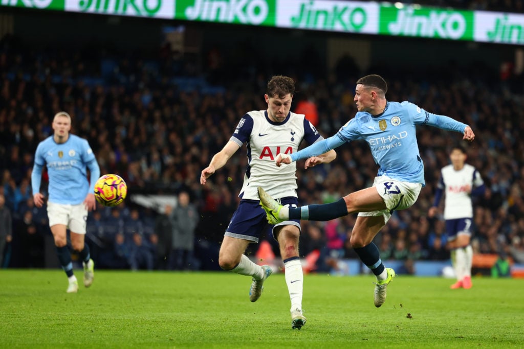 Phil Foden in action for Man City.