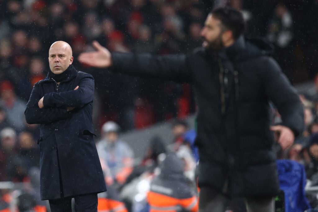 Liverpool's manager Arne Slot and Manchester United's head coach Ruben Amorim look on during an English Premier League football match