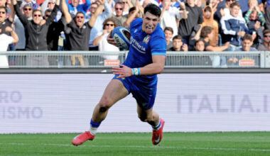 Italy's Tomasso Menoncello scores a try during 2025 Six Nations match against France.