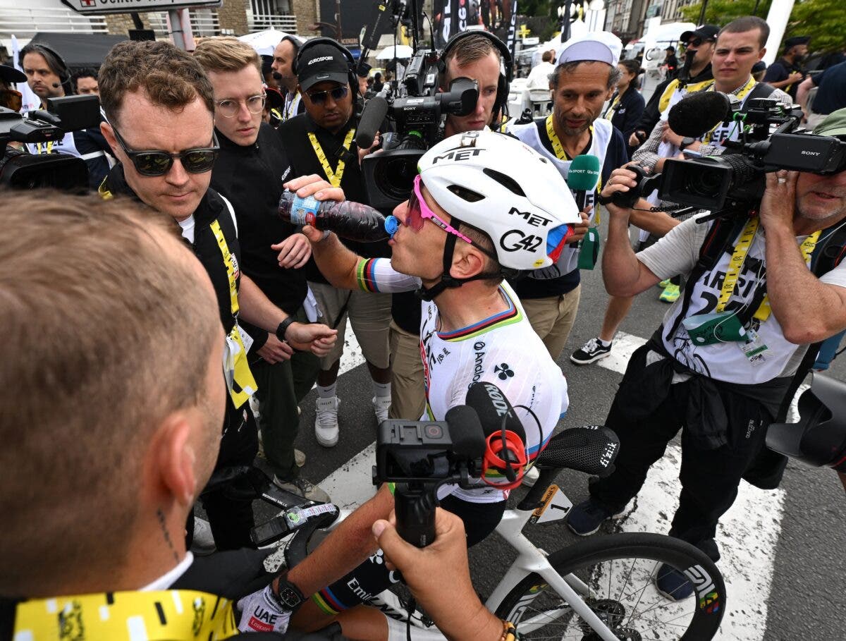 Pogačar drinks cherry juice at the Tour de France