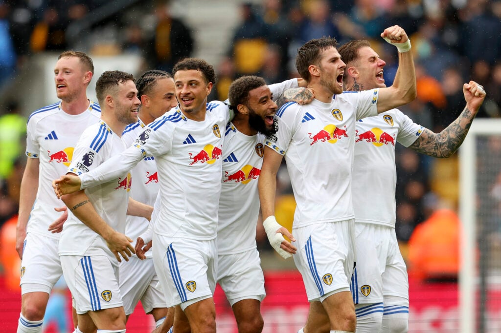 Leeds United players celebrate after scoring against Wolves in the Premier League