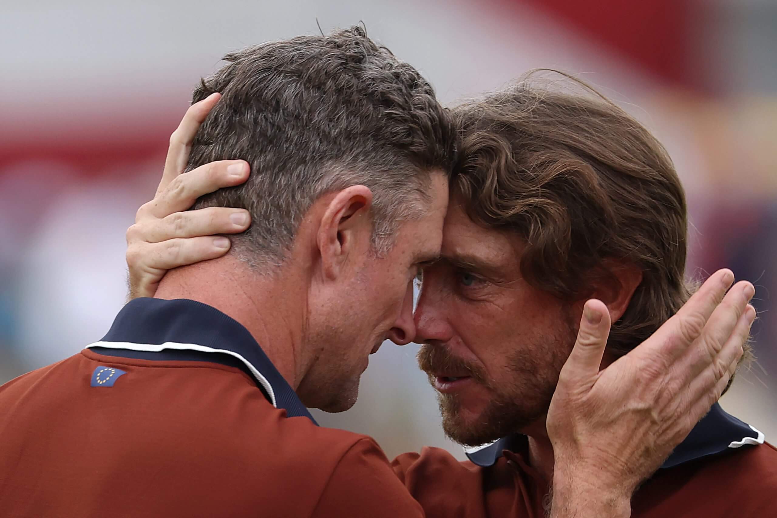 Justin Rose and Tommy Fleetwood lock their foreheads together in a sign of their bond during the 2025 Ryder Cup.