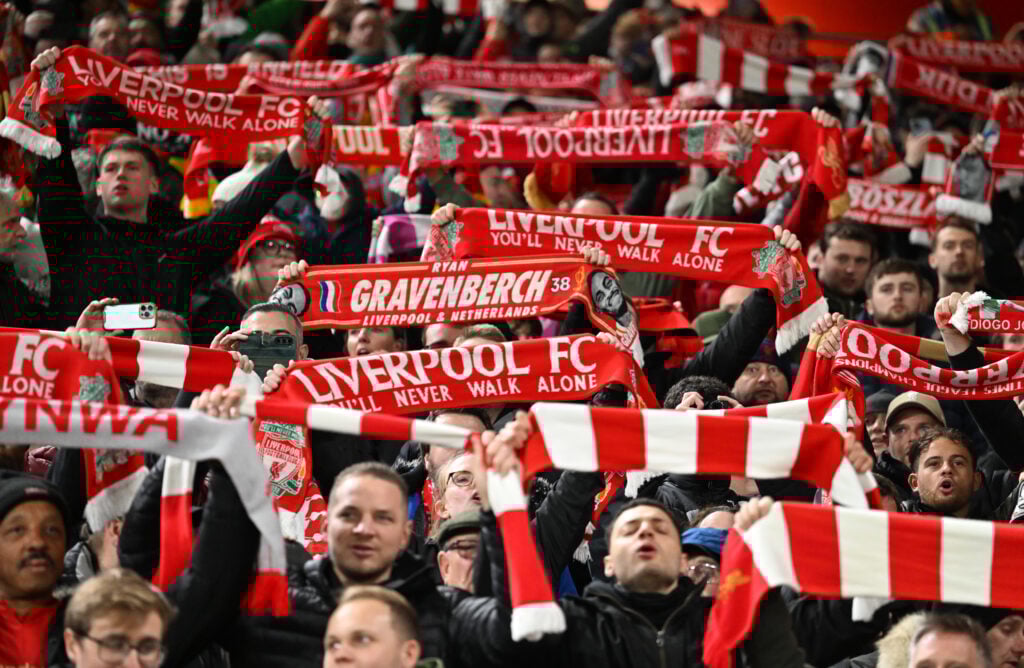 Liverpool fans display scarves at Anfield