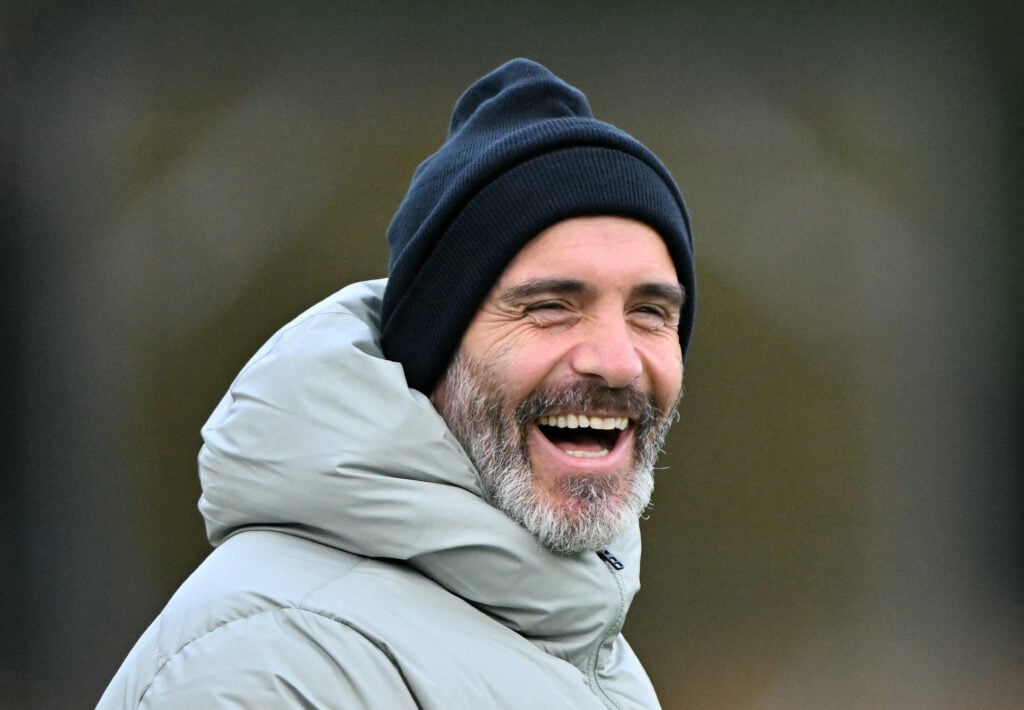 Enzo Maresca smiles during Chelsea training