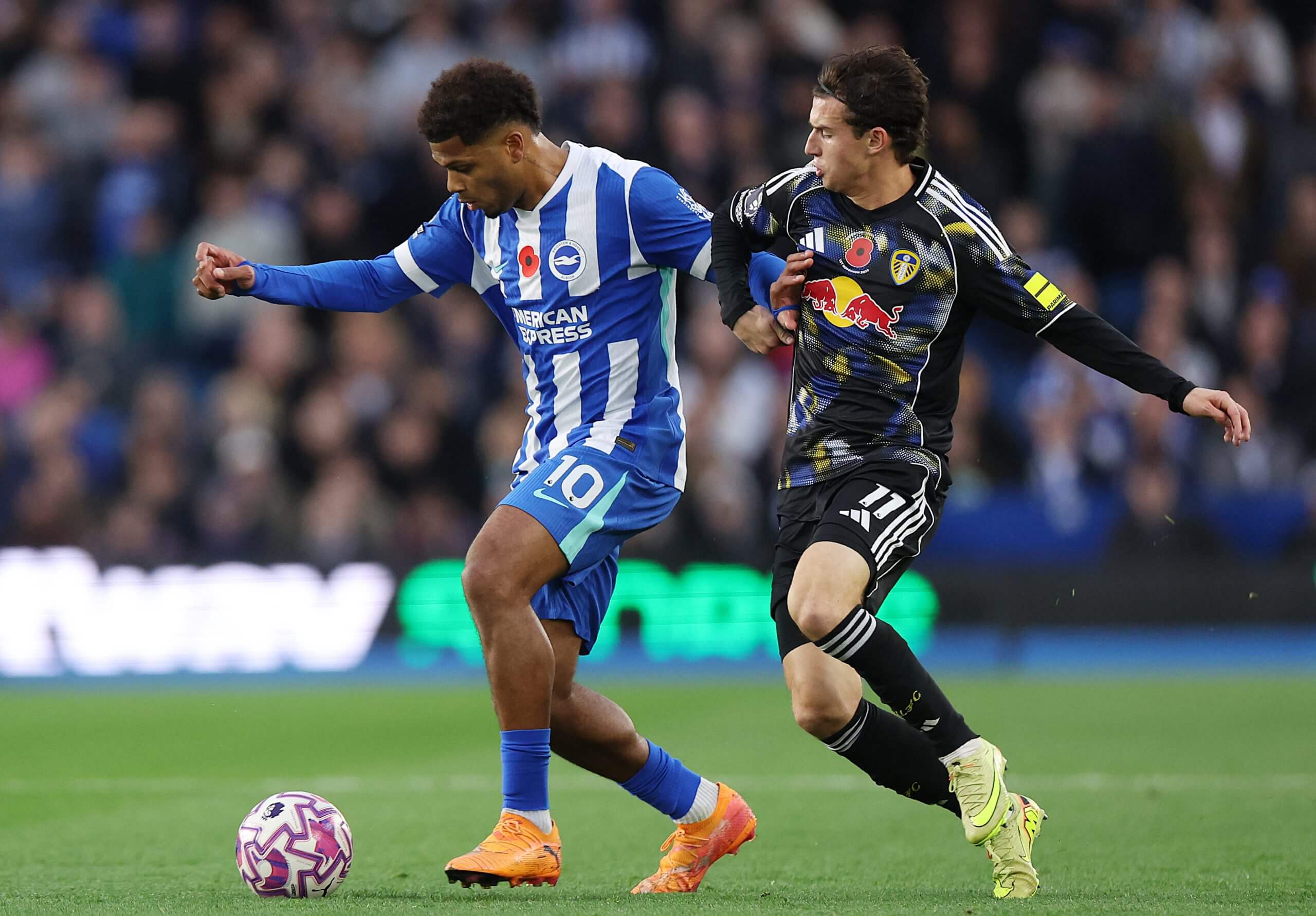 Georginio Rutter of Brighton and Hove Albion in action against Brenden Aaronson of Leeds United during the Premier League match between Brighton & Hove Albion and Leeds United 