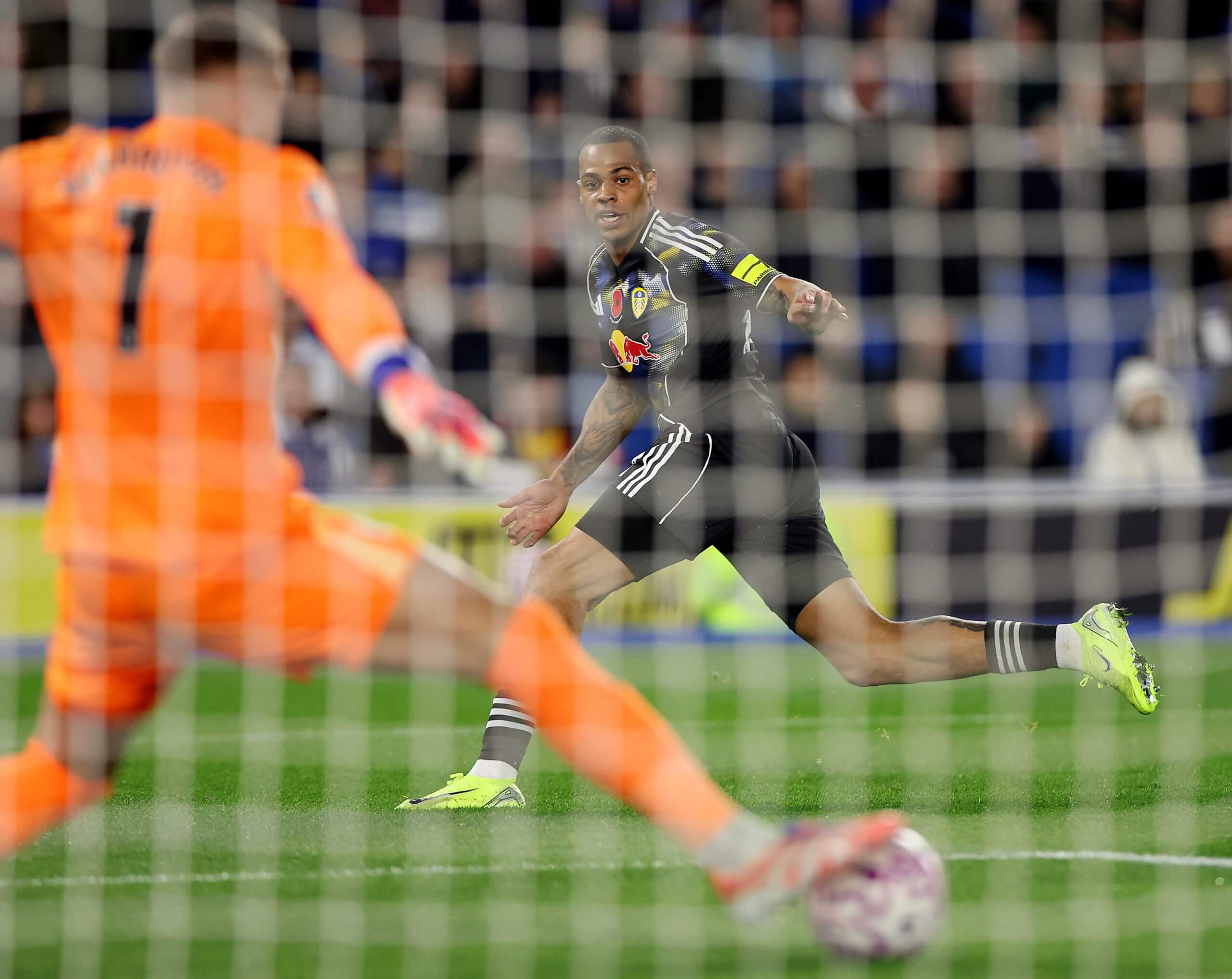 Lukas Nmecha of Leeds United watches his shot on goal get saved by Bart Verbruggen of Brighton and Hove Albion 