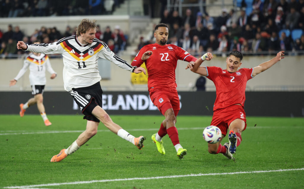 Nick Woltemade of Germany scores his second goal against Luxembourg in a 2026 World Cup qualifier.