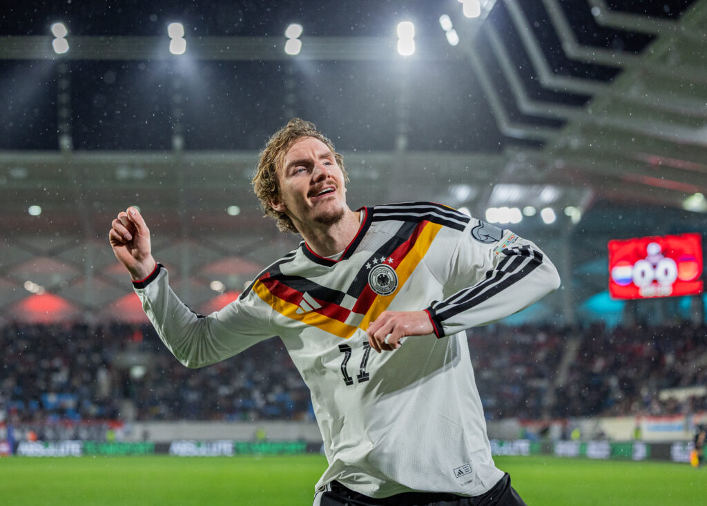 Nick Woltemade celebrates scoring for Germany.
