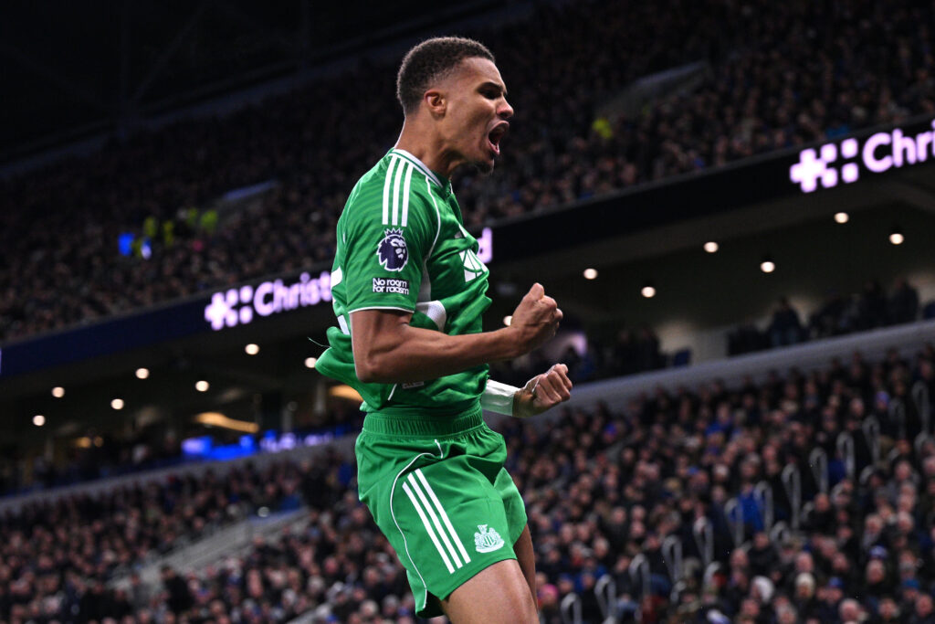 Malick Thiaw celebrates after scoring for Newcastle United against Everton.