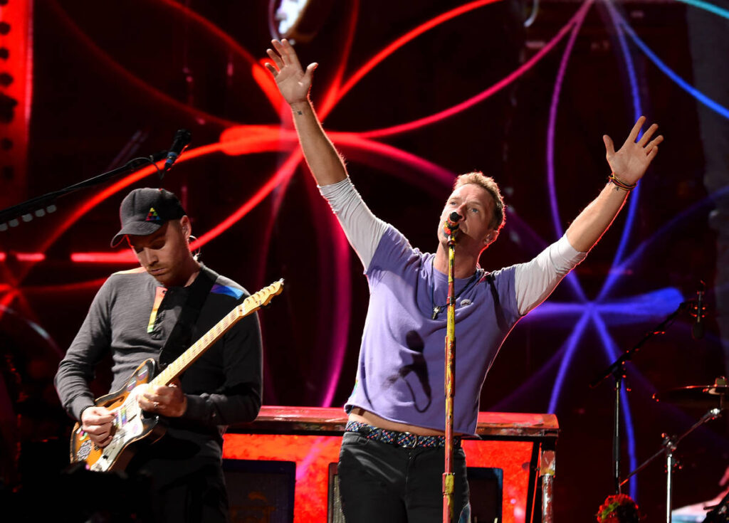 Coldplay's Chris Martin and Jonny Buckland playing a show at the Rose Bowl