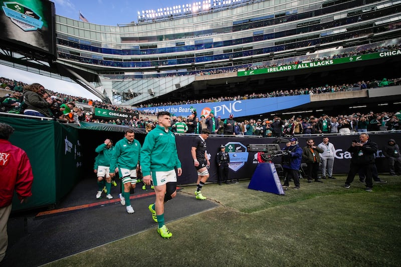 Dan Sheehan leads Ireland on to the pitch before the game at Soldier Field. Photograph: Robert Alam/Photosport/Inpho