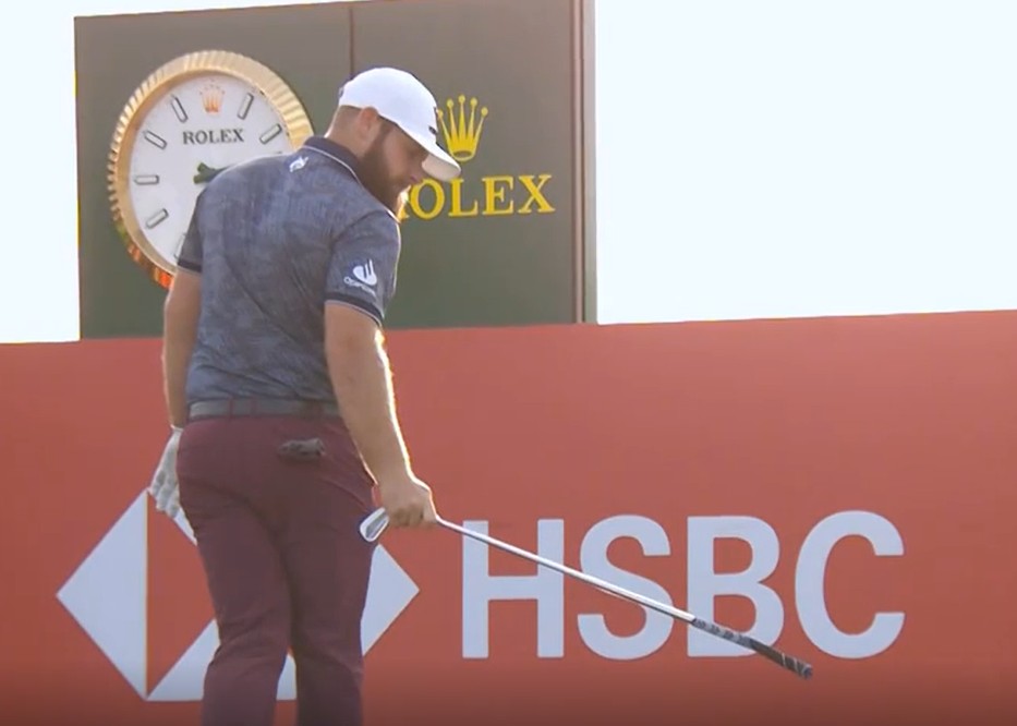 Hatton smashed his club after finding the bunker at the par-three 17th