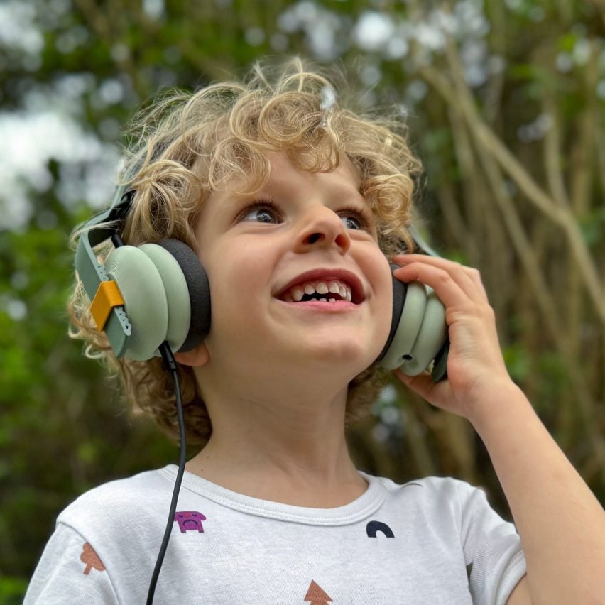 Little boy wearing the Kibu headphones