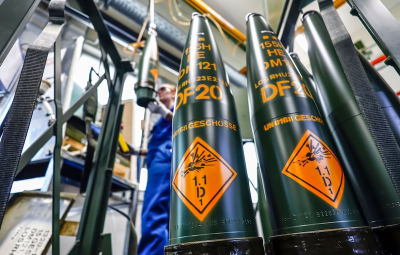 An employee of Rheinmetall works in the production of 155mm artillery shells in Unterluess, Germany. Photograph: Hannibal Hanschke/EPA