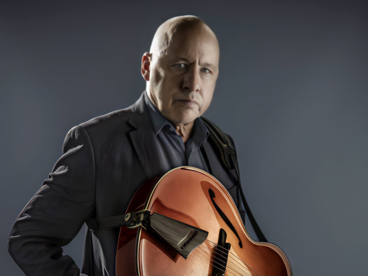 The Mark Knopfler song that's a "two-minute take on a two-ton book"