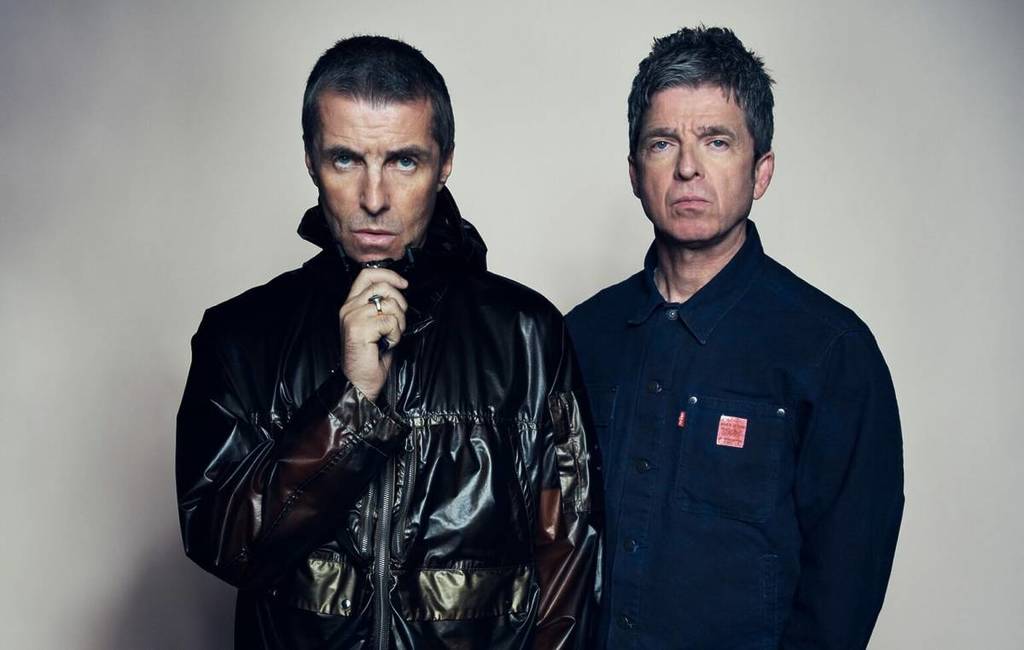 Liam Gallagher (left) and Noel Gallagher (right) in press shots ahead of the Oasis reunion