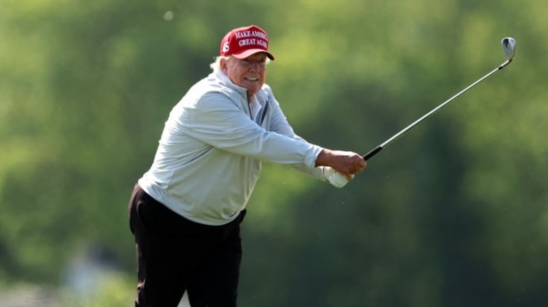 STERLING, VIRGINIA - MAY 25: Former President Donald Trump follows his second shot during the pro-am prior to the LIV Golf Invitational - DC at Trump National Golf Club on May 25, 2023 in Sterling, Virginia. (Photo by Rob Carr/Getty Images)