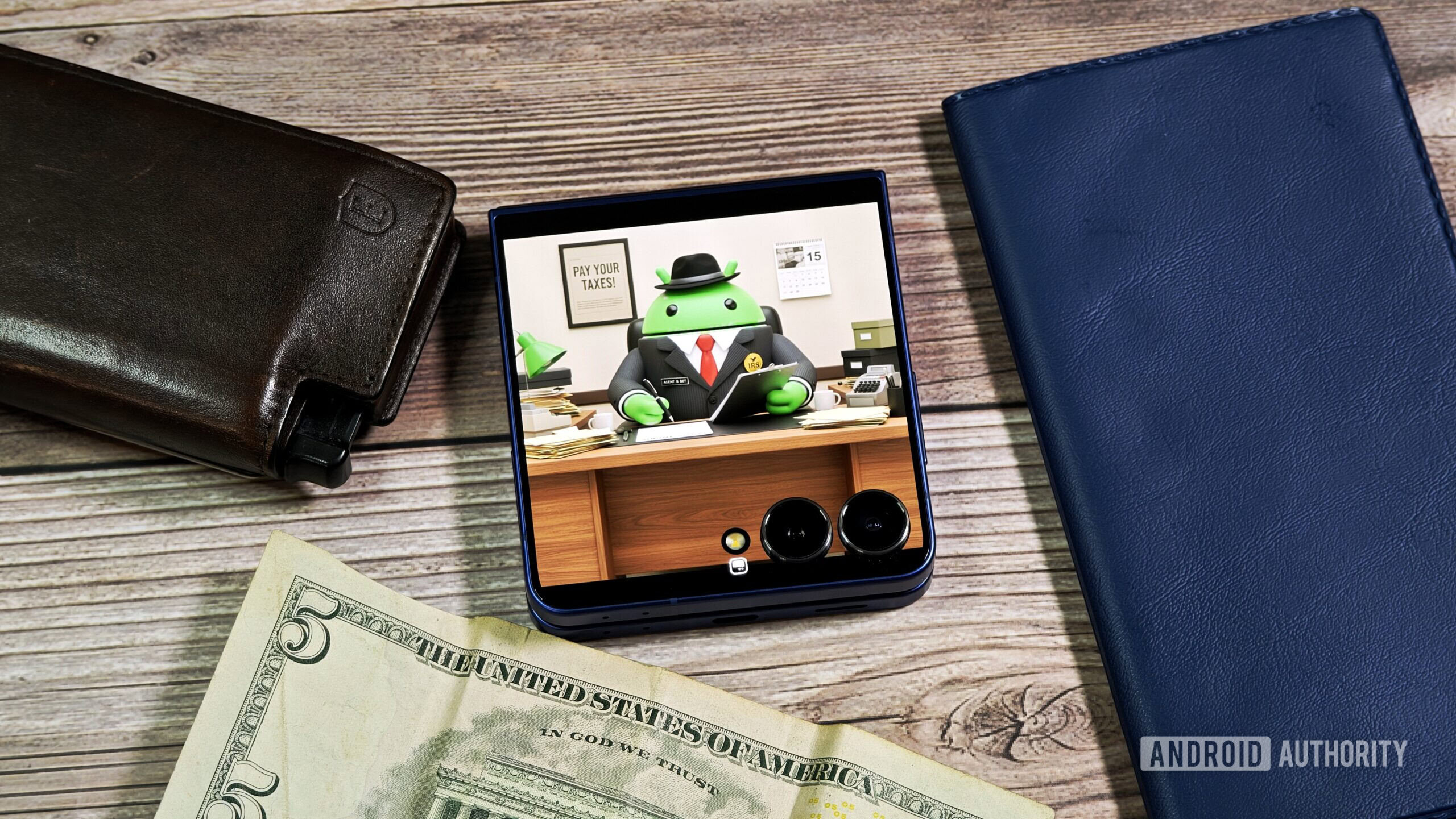 Photo of Android Bot dressed up as an IRS agent Photo of Android Bot dressed up as an IRS agent