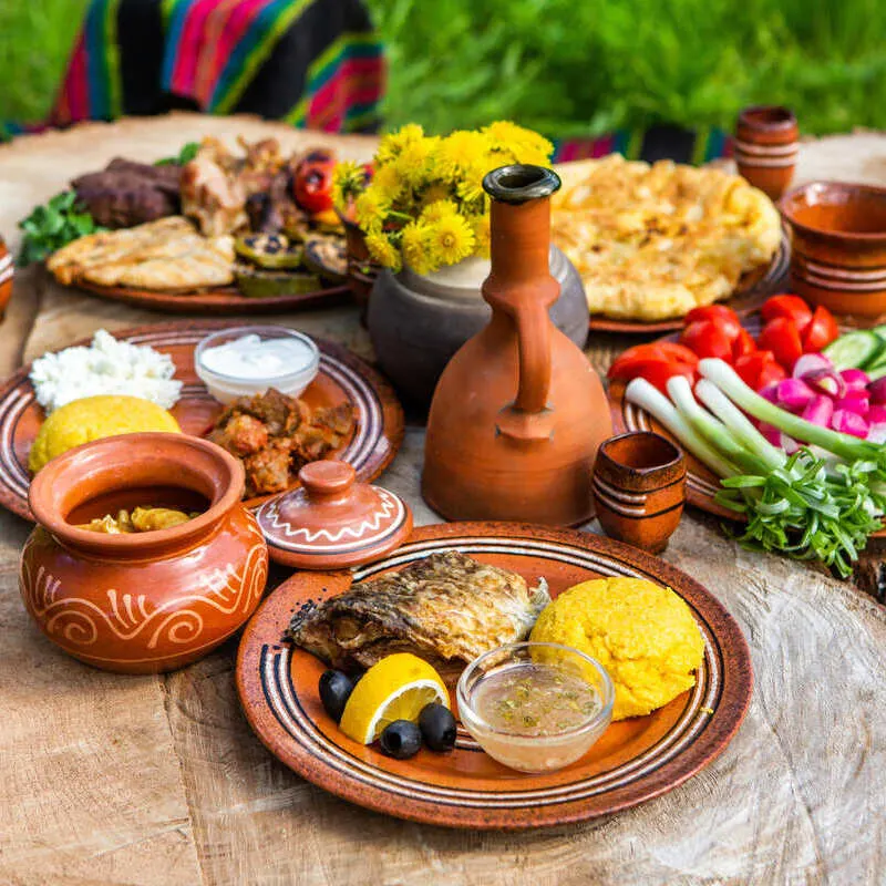 Romanian Cuisine Served Alfresco In Romania Or Moldova, Eastern Europe.jpg