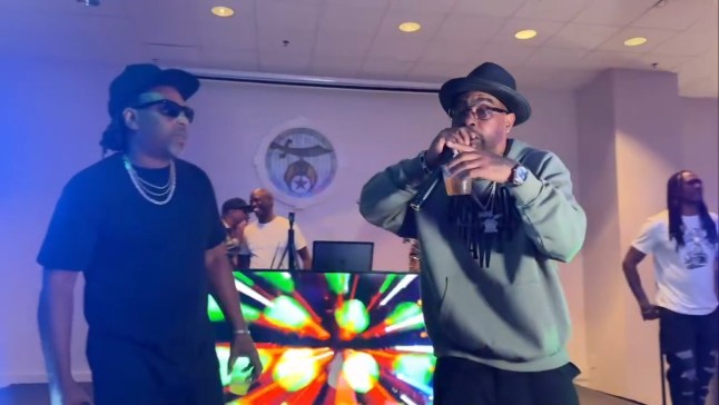 Young Bleed (fedora) seen onstage with Rapper/Performer Panama Jack in this screengrab of a video posted on June 12, 2025. | Headline - Rapper Young Bleed (Glenn Reid Clifton Jr.) of Louisiana and part of Master P's No Limit Records died on November 1, 2025 at the age of 51 after suffering a brain aneurysm in Las Vegas