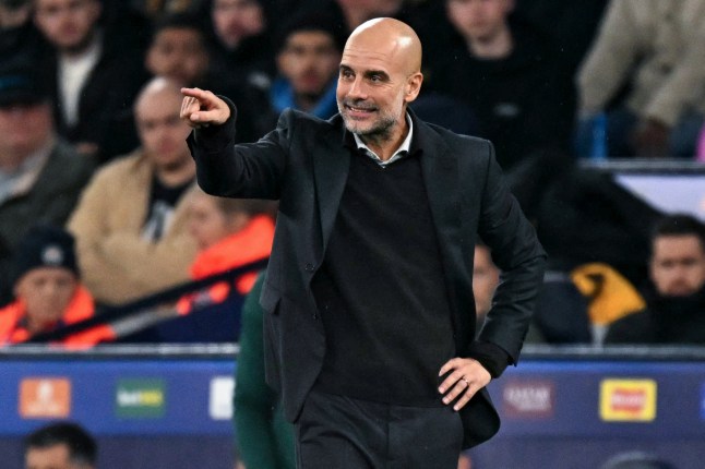 TOPSHOT - Manchester City's Spanish manager Pep Guardiola reacts during the UEFA Champions League football match between Manchester City and Borussia Dortmund at the Etihad Stadium in Manchester, north west England, on November 5, 2025. (Photo by Oli SCARFF / AFP) (Photo by OLI SCARFF/AFP via Getty Images)