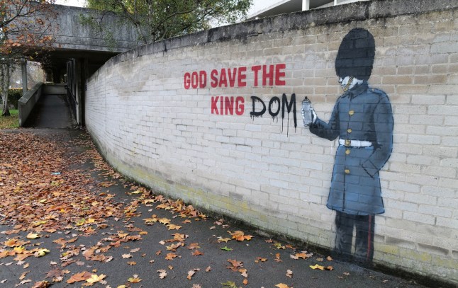 The rumoured new 'Banksy' artwork on display on a wall in Windsor
