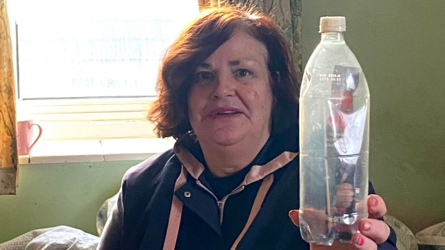 A woman was left shocked after her 'message in a bottle' was sent back with an angry letter - telling her to stop littering. Lorraine Forbes, 58, has long been sending plastic bottles with letters inside them out to sea with hopes of sparking a romantic connection with a stranger. Her messages have received responses from as far as Holland and France over the years - but she says that they have mostly washed back up on the shores of nearby beaches. However, Lorraine, from Eastbourne, East Sussex, recently received a ?nasty? shock when one of her letters on the back of a John Lydon gig flyer came back with an angry note from a litter picker. Photo released 14/11/2025