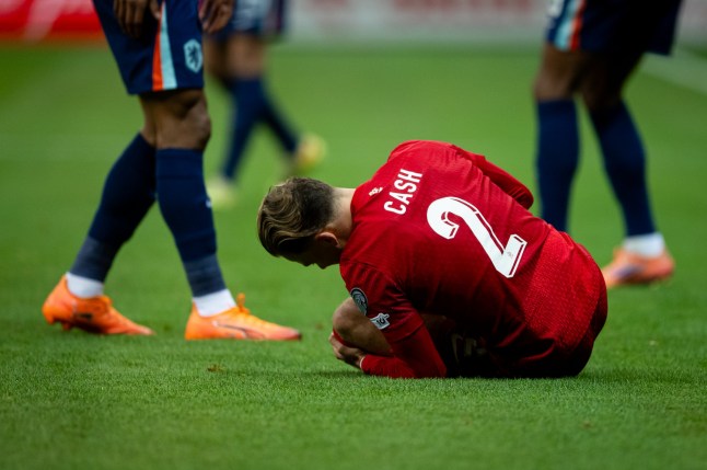 WARSAW, POLAND - NOVEMBER 14: Matty Cash of Poland injured during the FIFA World Cup 2026 qualifier match between Poland and Netherlands at PGE Narodowy on November 14, 2025 in Warsaw, Poland. (Photo by Mateusz Slodkowski - UEFA/UEFA via Getty Images)