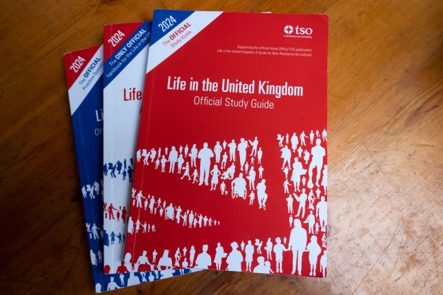 3B1XA25 Set of three Life in the United Kingdom books with application test to enable people to apply for British Citizenship on table London England UK