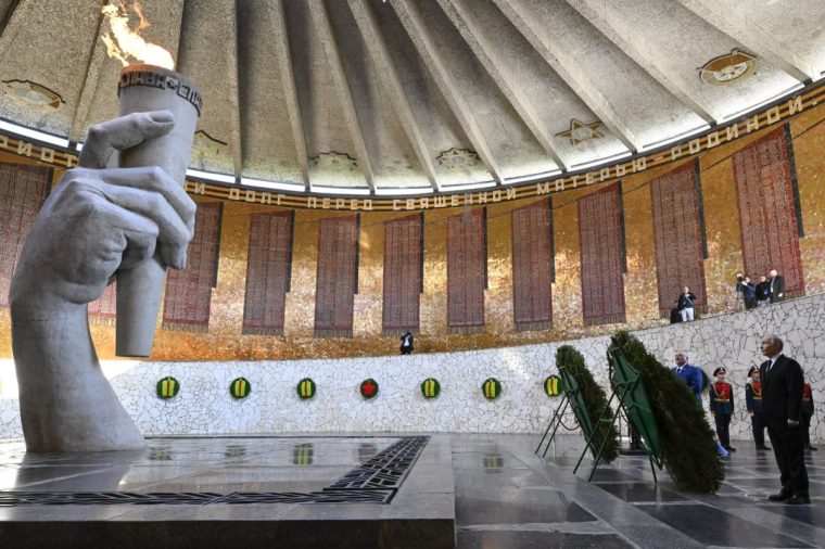 Russian President Vladimir Putin and Belarus' President Alexander Lukashenko attend a wreath-laying ceremony at the Eternal Flame in the Hall of Military Glory at the Mamayev Kurgan World War Two (WWII) Memorial complex in Russia's southern city of Volgograd on April 29, 2025, as part of commemorative events for the upcoming 80th anniversary of the Soviet Union's victory over Nazi Germany during WWII, which will be celebrated on May 9. (Photo by Alexander NEMENOV / AFP) (Photo by ALEXANDER NEMENOV/AFP via Getty Images)