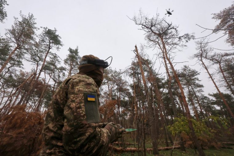 A pilot from the 13th Khartiia Operational Brigade of Ukraine's National Guard flies an FPV drone during a training session to practice flight tactics in conditions simulating combat and maximize the effectiveness of strikes against infantry and fortified positions, on November 5, 2025. (Photo by Viacheslav Madiievskyi/Ukrinform/NurPhoto via Getty Images) NO USE RUSSIA. NO USE BELARUS. (Photo by Ukrinform/NurPhoto via Getty Images)