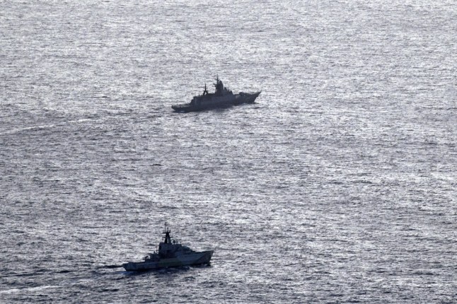 In this undated aerial photo released by the United Kingdom Ministry of Defence, HMS Severn, lower section, is seen tracking the Russian corvette RFN Stoikiy off the UK coast. (United Kingdom Ministry of Defence via AP)
