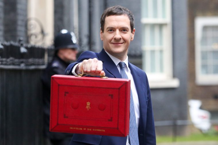 George Osborne, U.K. chancellor of the exchequer, holds the dispatch box containing the budget, as he exits 11 Downing Street in London, U.K., on Wednesday, March 16, 2016. Osborne is set to unveil sweeping education reforms in his Budget on Wednesday as he seeks to sweeten the pill of austerity three months before the referendum on European Union membership. Photographer: Chris Ratcliffe/Bloomberg via Getty Images