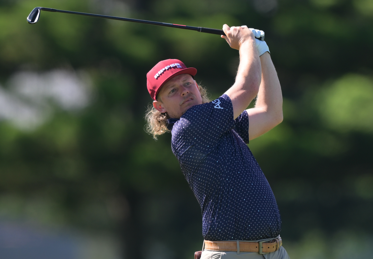 Cameron Smith holds his finish on an iron shot