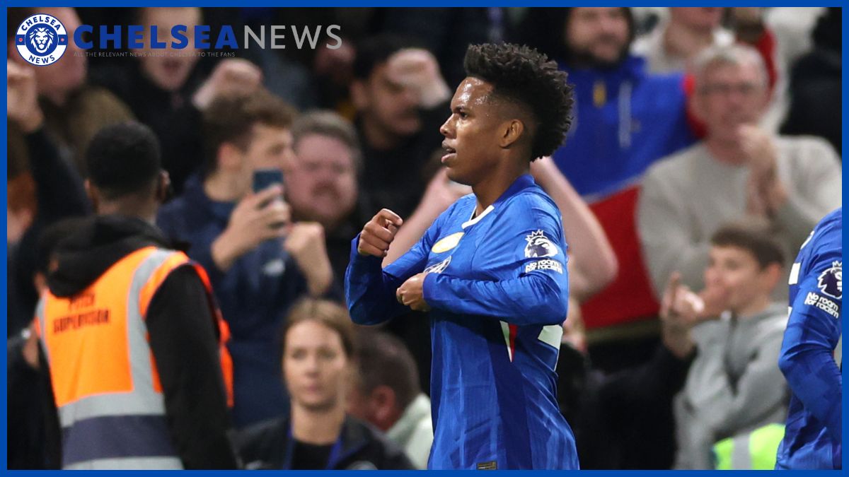Estevao Willian taps the badge.