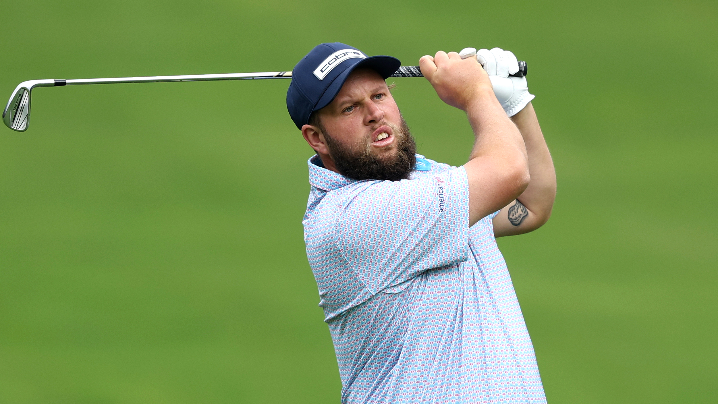 Andrew Johnston hits an iron shot during the 2024 BMW PGA Championship at Wentworth