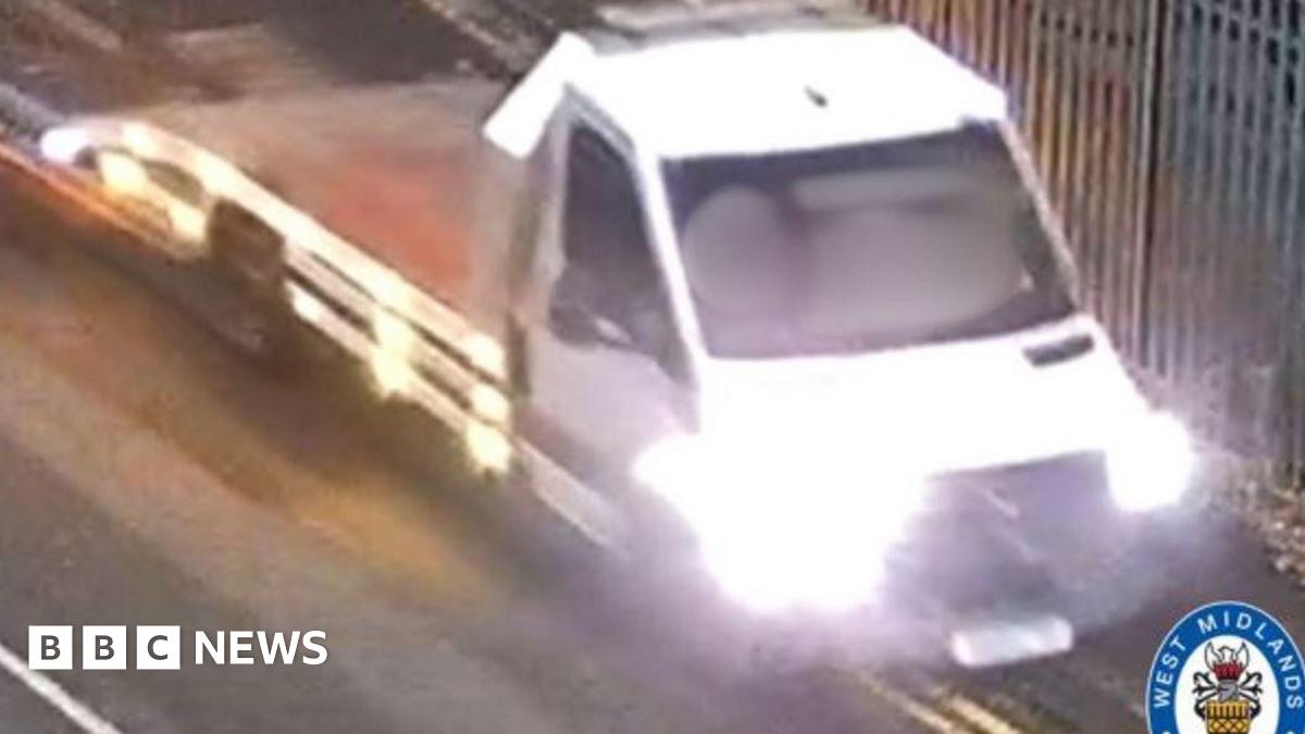 The image is of a blurred white van with its lights on. There is a West Midlands Police logo in the bottom right corner.