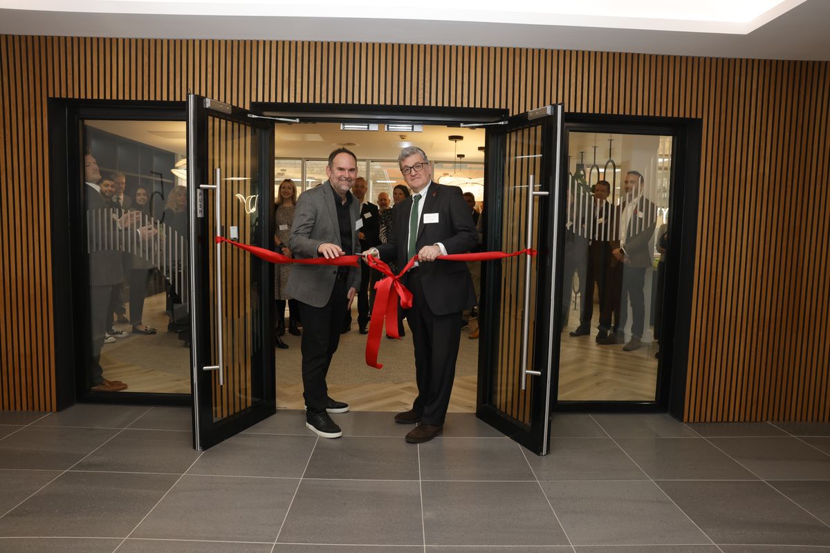 Staff from Smiths mark the opening of the company's new offices in Birmingham