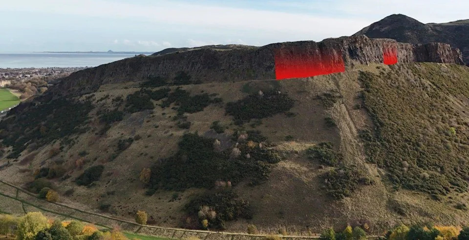 A picture of the radical road path taken by a drone camera. Marked on the picture are two areas in red which are considered to be the most dangerous for rock fall.