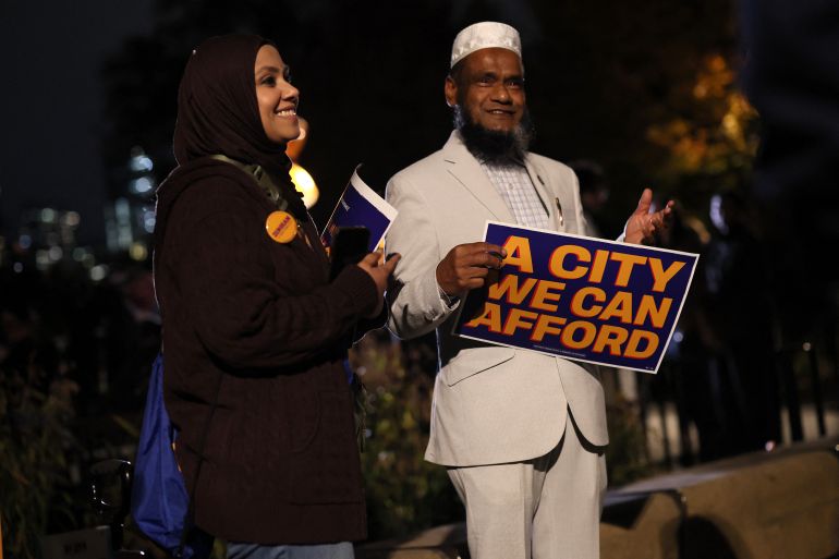 NEW YORK, NEW YORK - NOVEMBER 03: Supporters of New York Mayoral Candidate Zohran Mamdani attend a campaign event at Dutch Kills Playground on November 03, 2025 in the Astoria neighborhood of the Queens borough in New York City. On the eve of Election Day, Mamdani was joined by elected officials as he spoke during a volunteer canvass launch in Astoria. Mamdani, who leads in the polls and is the front runner in the mayoral election, is running against Independent New York City mayoral candidate Andrew Cuomo and Republican mayoral candidate Curtis Sliwa. More than 735,000 people have voted early, according to the Board of Elections, more than four times as many as in the 2021 contest. Michael M. Santiago/Getty Images/AFP (Photo by Michael M. Santiago / GETTY IMAGES NORTH AMERICA / Getty Images via AFP)