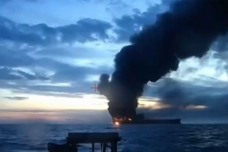 This video grab taken from images released by the Security service of Ukraine (SBU) on November 29, 2025, shows smoke rising from a cargo ship on fire in the Black Sea off the Turkish coast, amid the ongoing Russian-Ukrainian conflict.