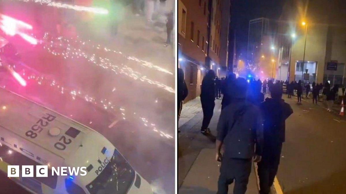 A photo of Nadia holding up her phone which shows Harkins tinder profile