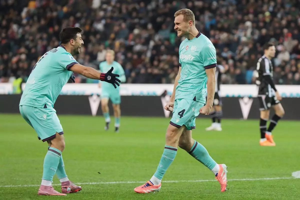 Bologna's Tommaso Pobega celebrates after scoring their side's first goal of the game during the Serie A soccer match between Udinese and Bologna in Udine, Italy, Saturday, Nov. 22, 2025. (Andrea Bressanutti/LaPresse via AP)