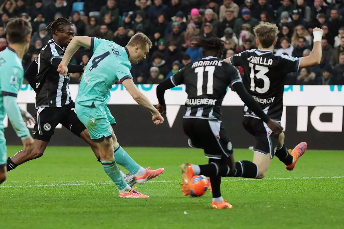 Bologna's Tommaso Pobega scores their side's first goal of the game during the Serie A soccer match between Udinese and Bologna in Udine, Italy, Saturday, Nov. 22, 2025. (Andrea Bressanutti/LaPresse via AP)