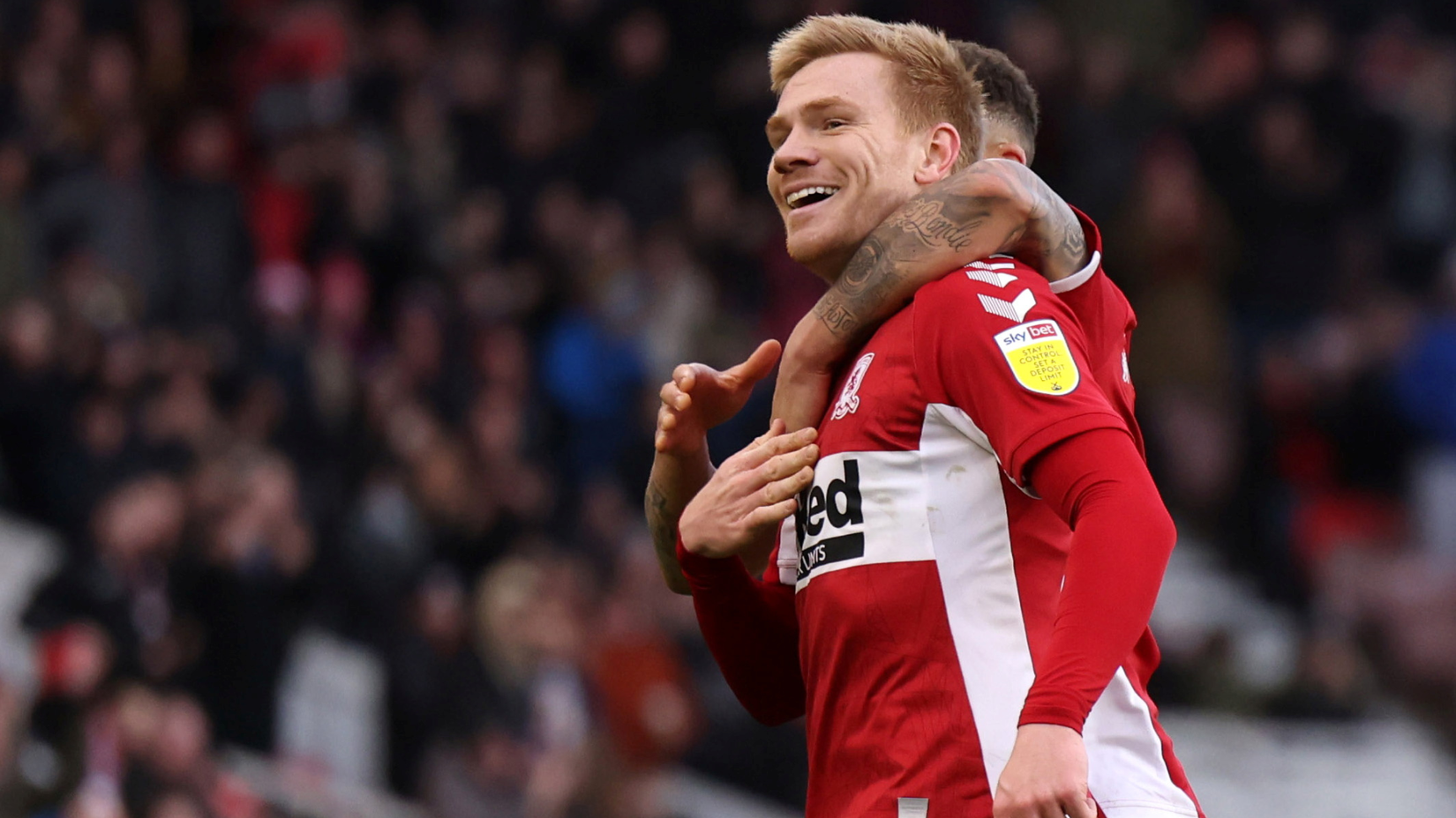 Soccer Football - Championship - Middlesbrough v Luton Town - Riverside Stadium, Middlesbrough, Britain - March 5, 2022 Middlesbrough's Duncan Watmore celebrates scoring their second goal with Marcus Tavernier Action Images/John Clifton EDITORIAL USE ONLY.