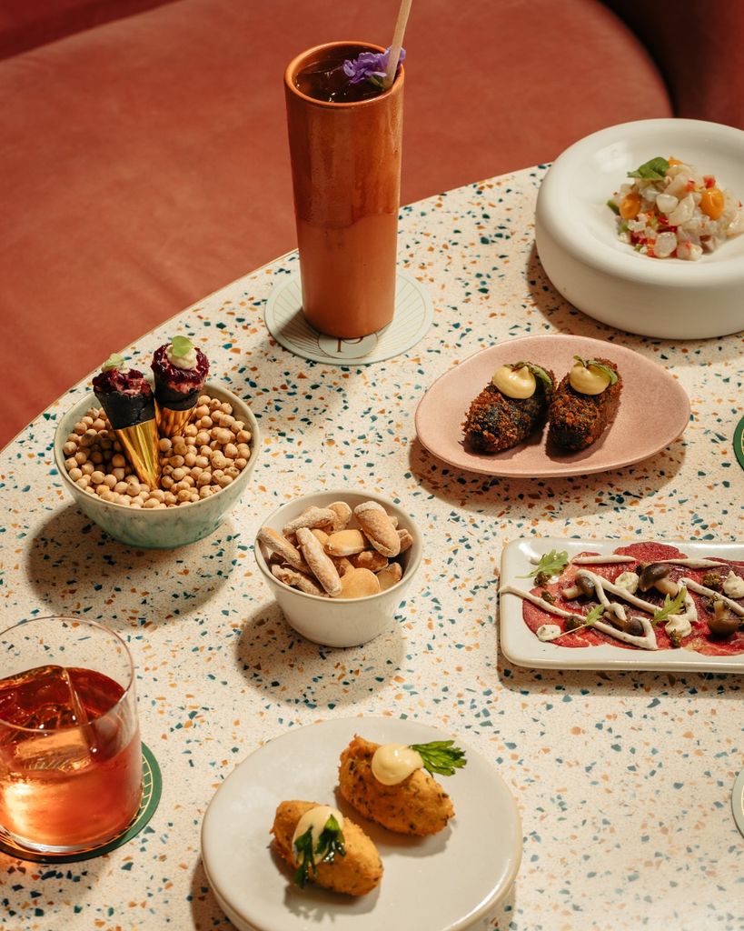 flatlay of small plates of food on table